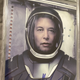 A signed 8x10 Photo of Elon Musk wearing a spacesuit that I found on eBay.